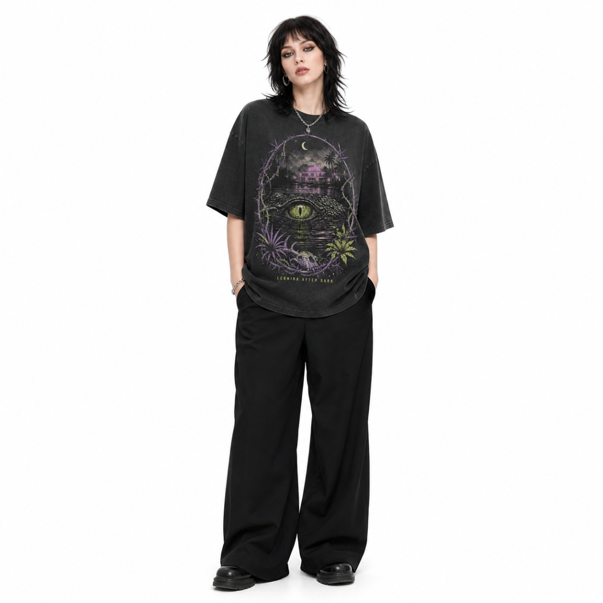 Leonida After Dark model wearing graphic T-shirt on white background