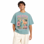 Paradise Has a Price model wearing graphic T-shirt on white background