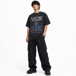 Vice Frequency model wearing graphic T-shirt on white background